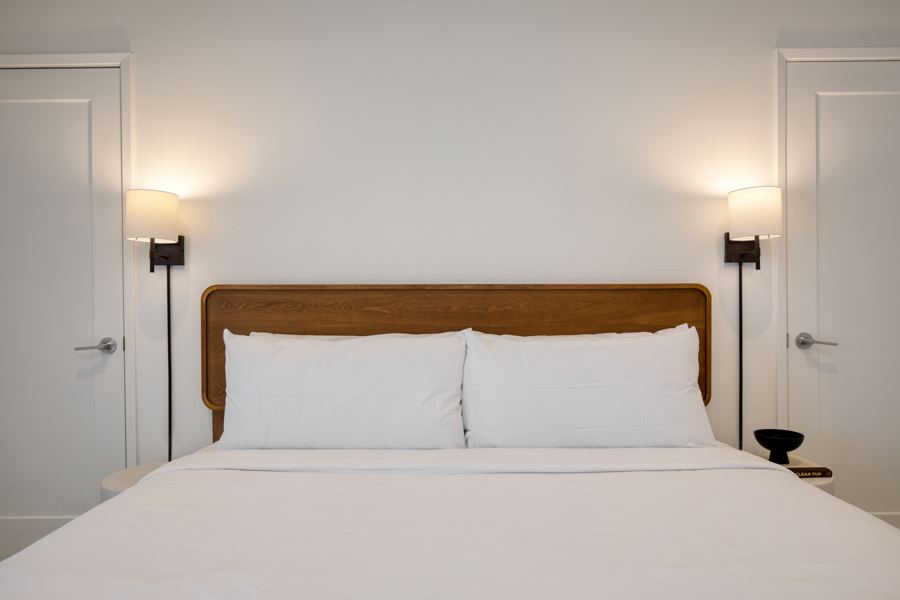 Bedroom with warm headboard